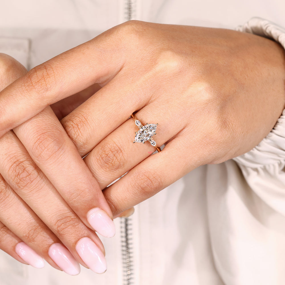 Six claw prong marquise diamond ring style.
