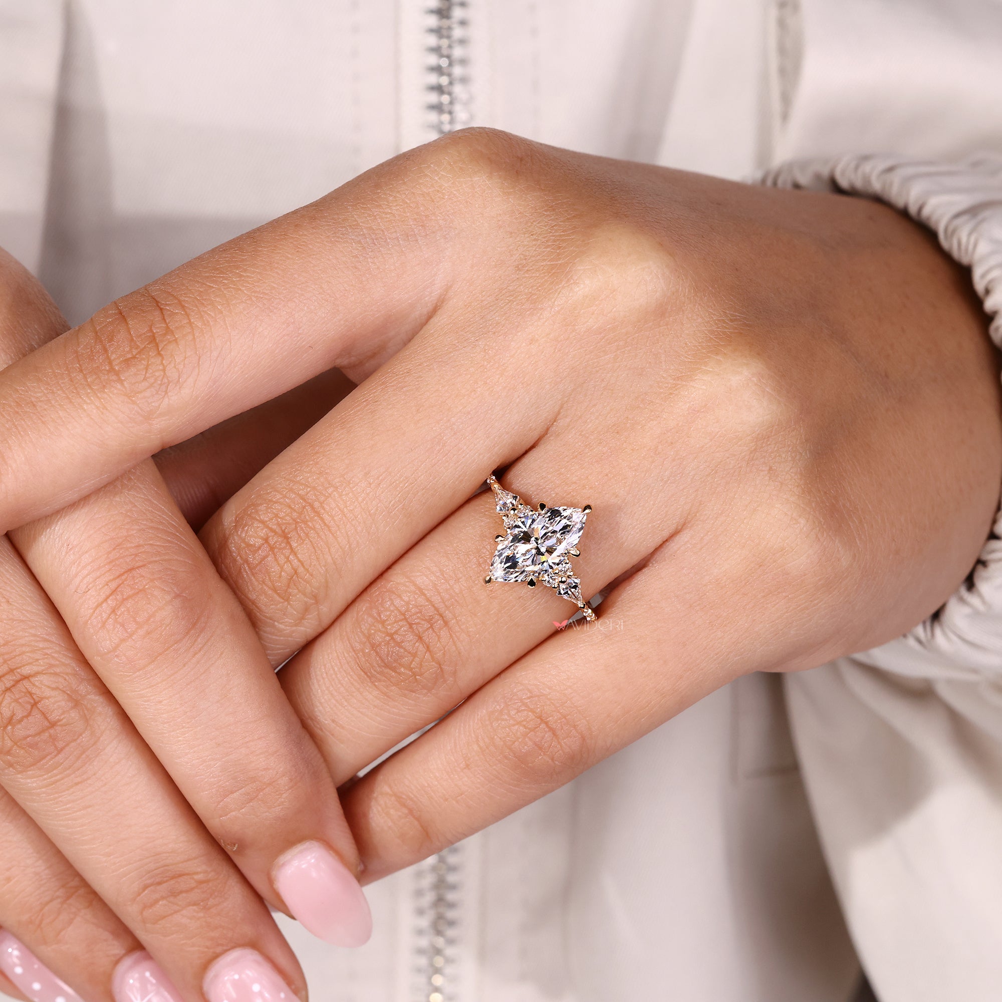 6 claw prong setting on lab-grown diamond ring.