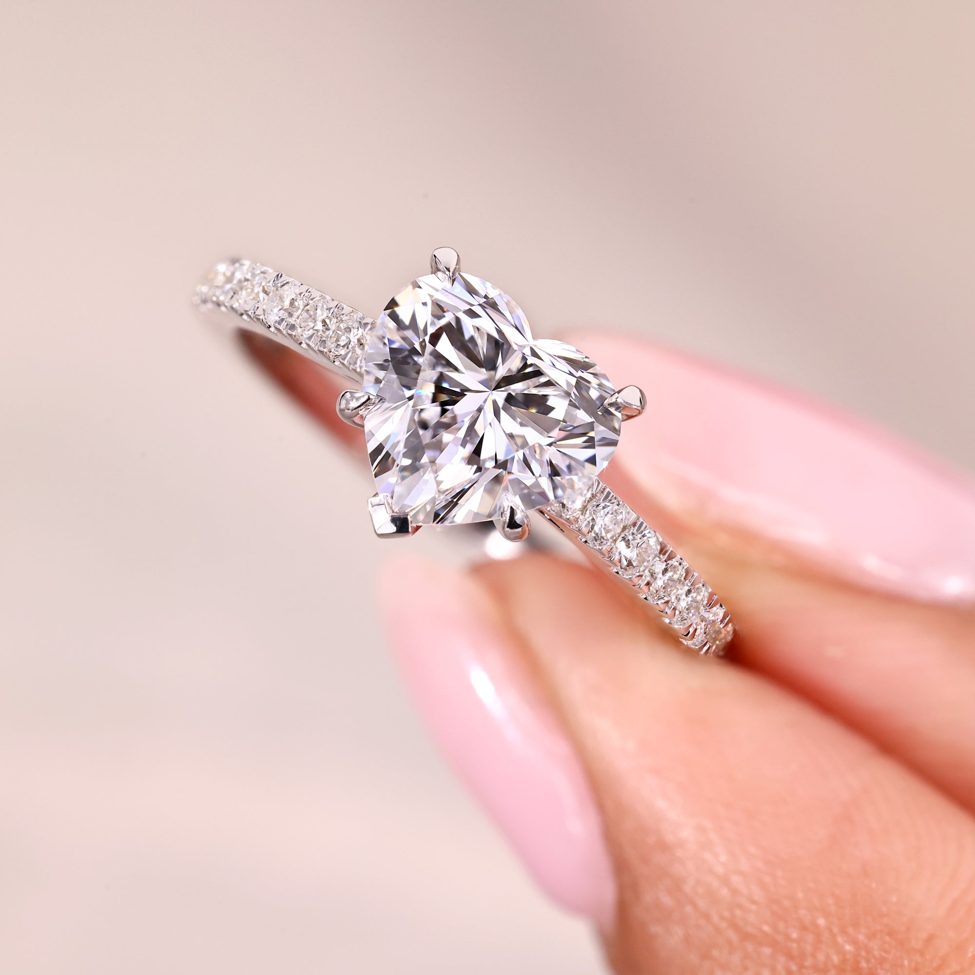 V prong setting with pave setting ring.