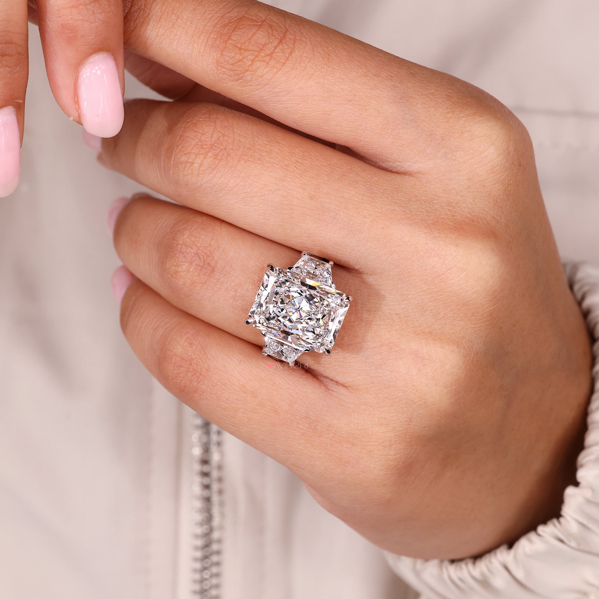 Four claw prong on white gold diamond ring.
