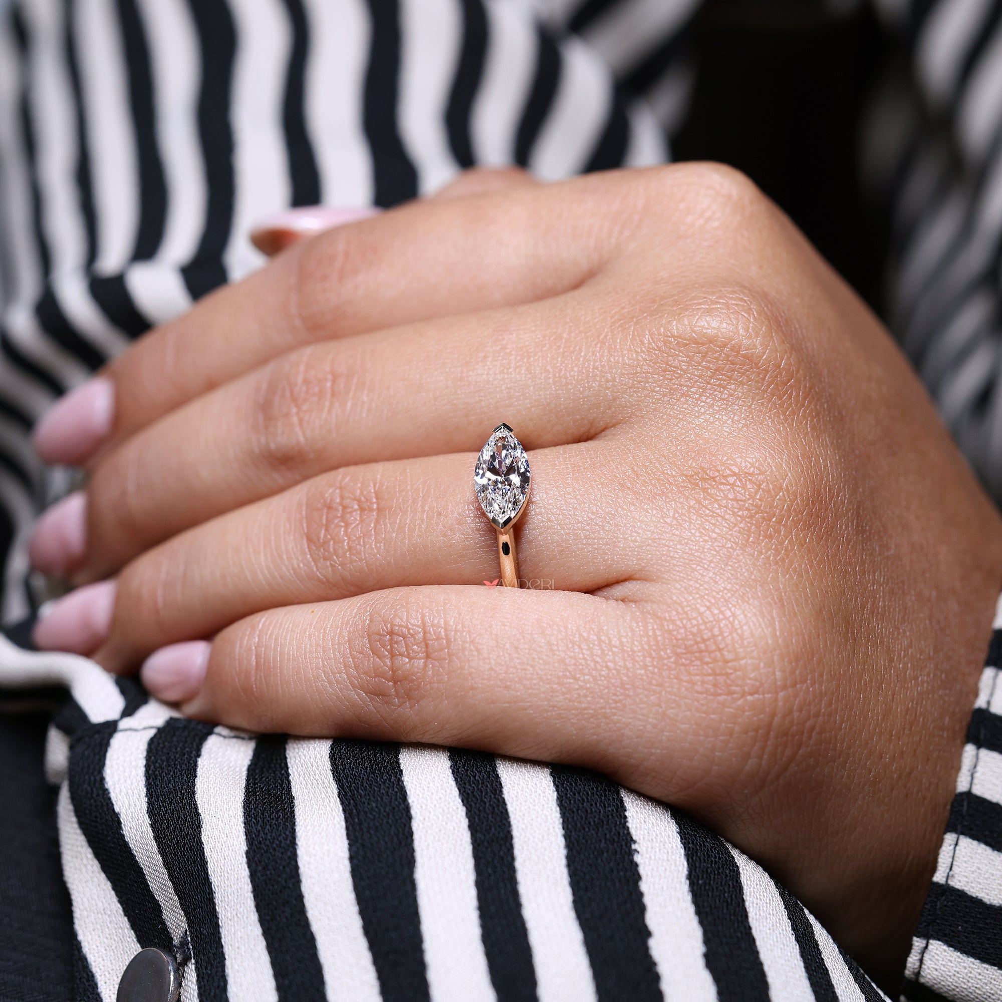 Lab-grown diamond ring in marquise diamond engagement ring.