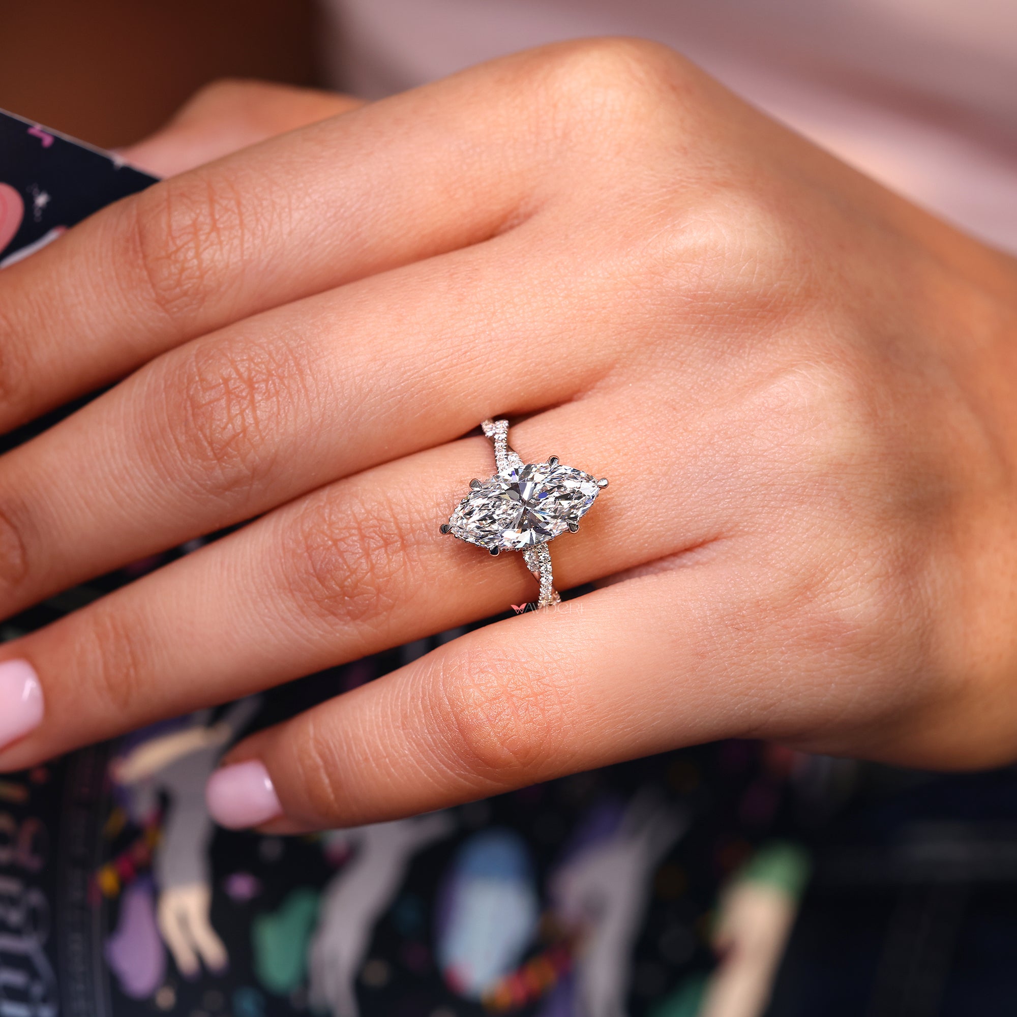 Six claw prong setting with white gold diamond ring.