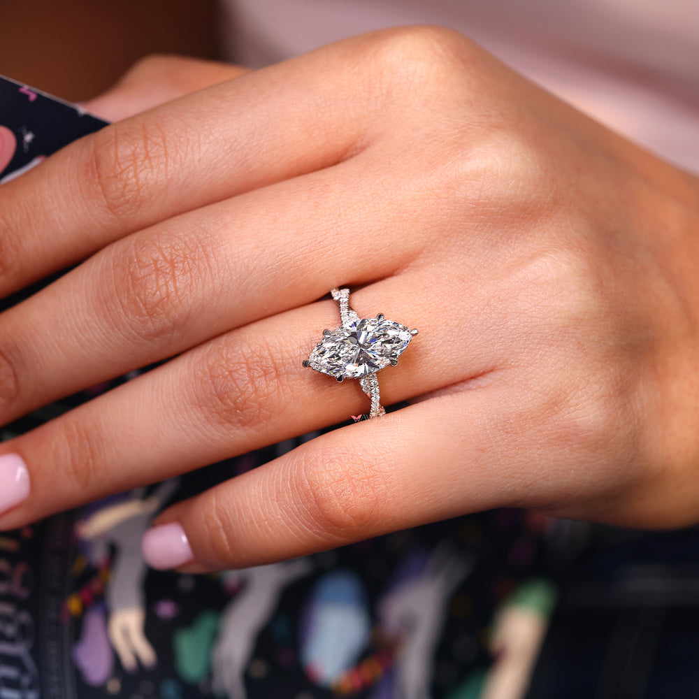 Six claw prong setting with white gold diamond ring.