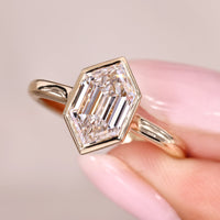 Hexagon Step Cut Diamond Ring In Cathedral Setting