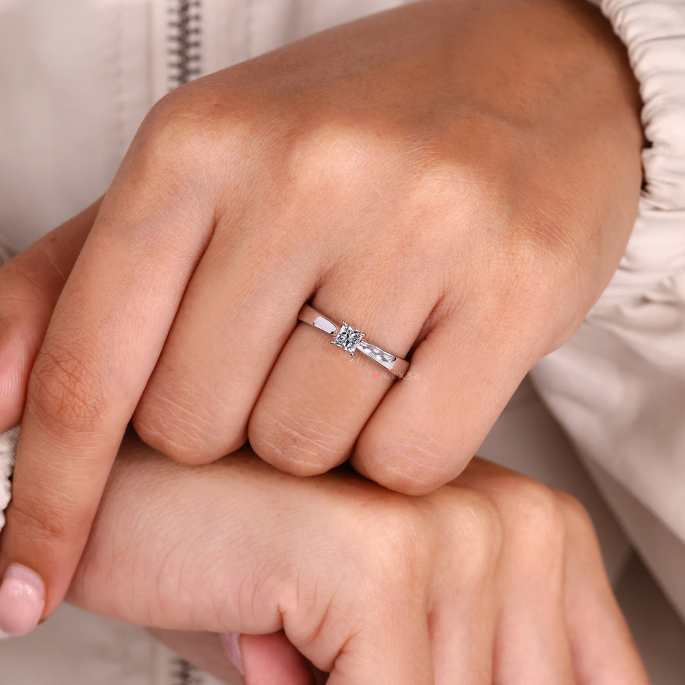 White gold diamond ring with princess cut solitaire ring.
