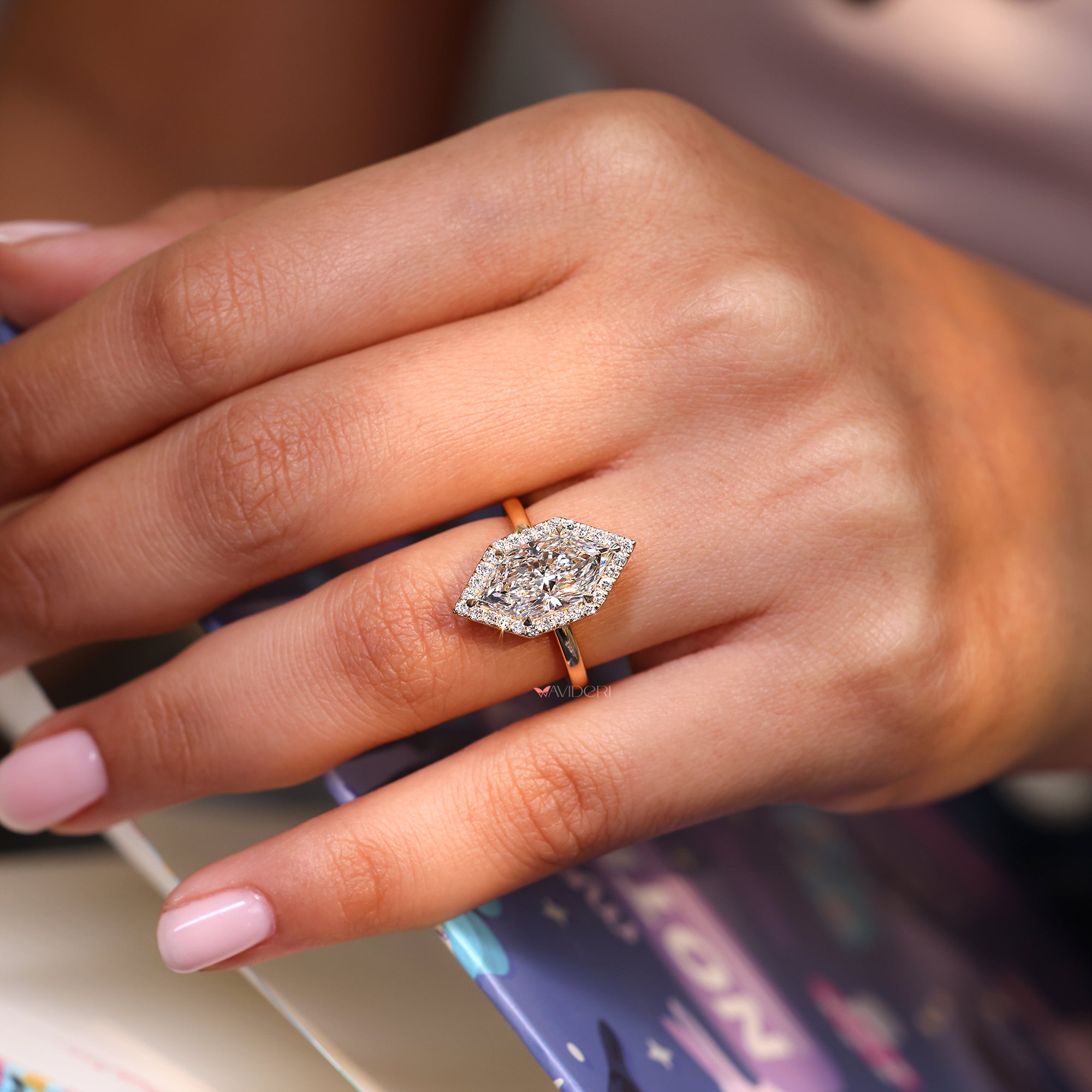 Dutch marquise engagement ring with six claw prong ring.