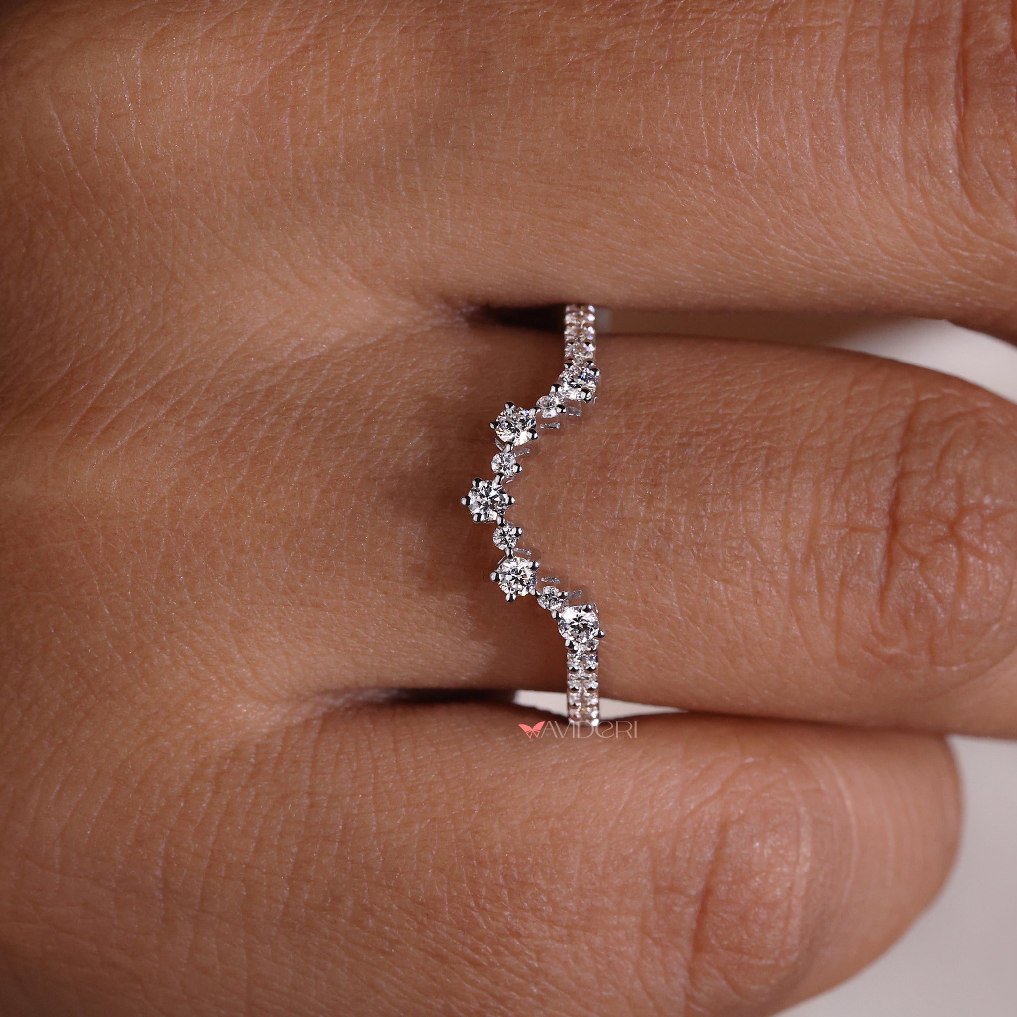 White gold wedding band with polished shine.
