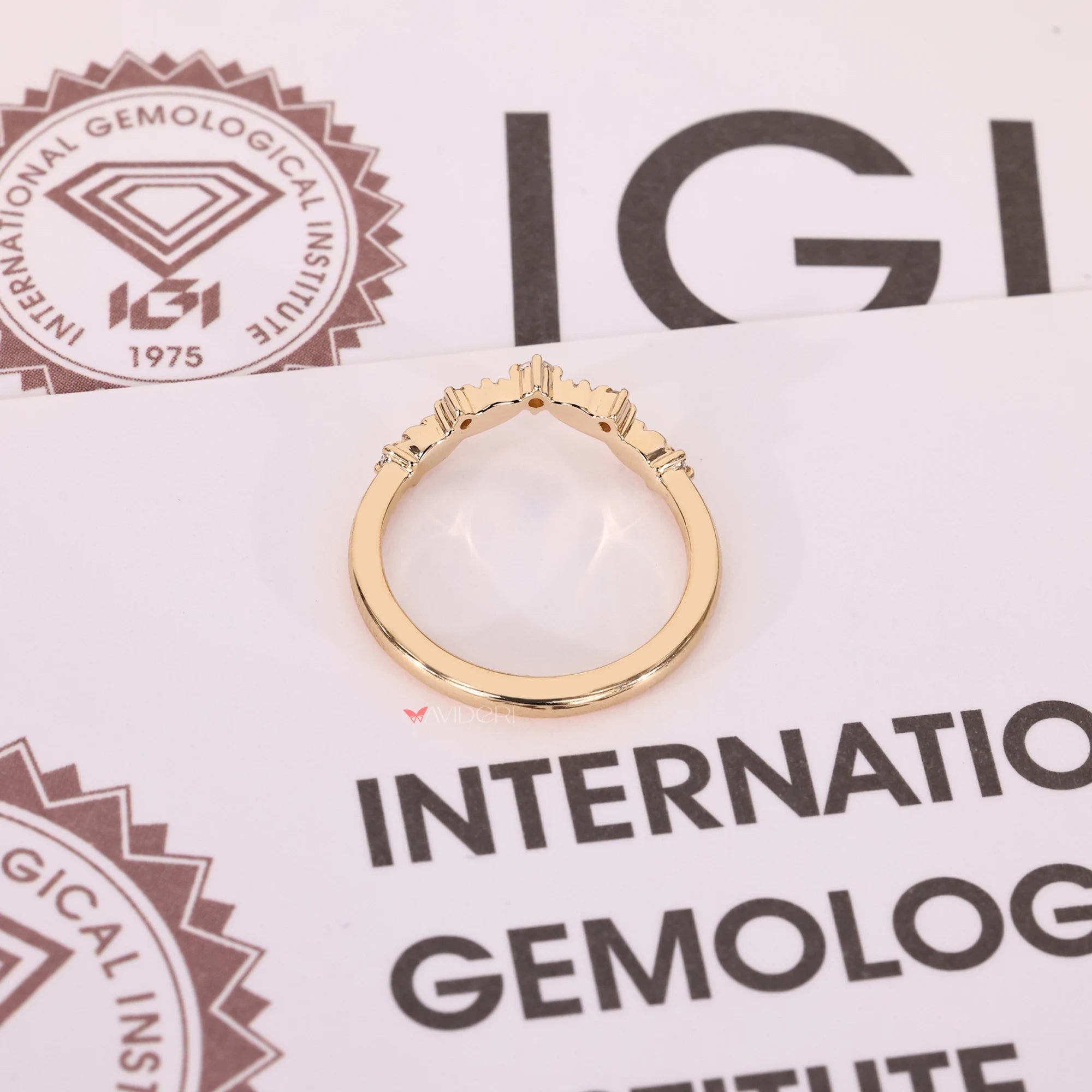 Buy a wedding band with IGI certified lab grown diamond.