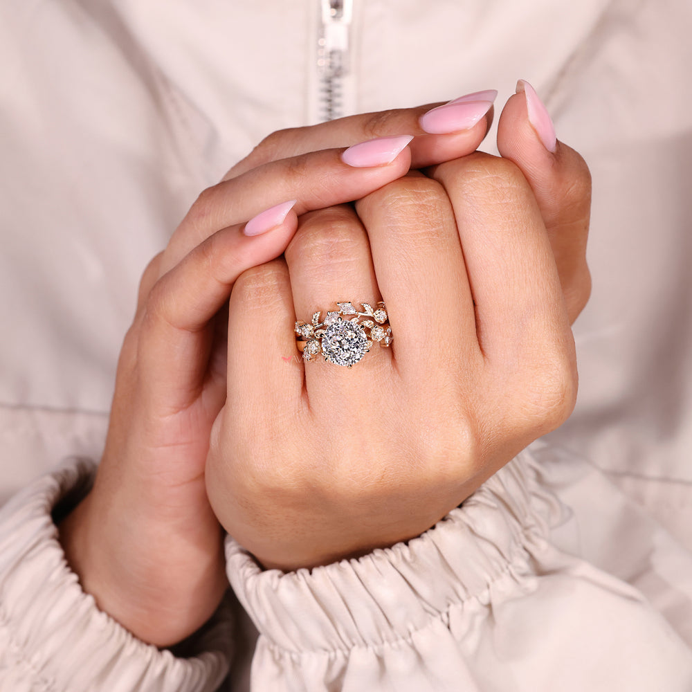 Nature inspired bridal set with marquise and round diamond curved band
