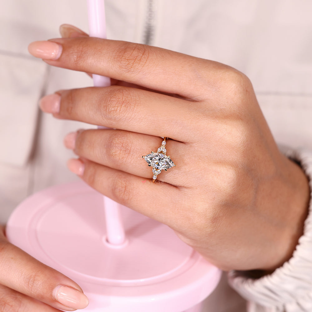 Marquise diamond engagement ring with muse setting.
