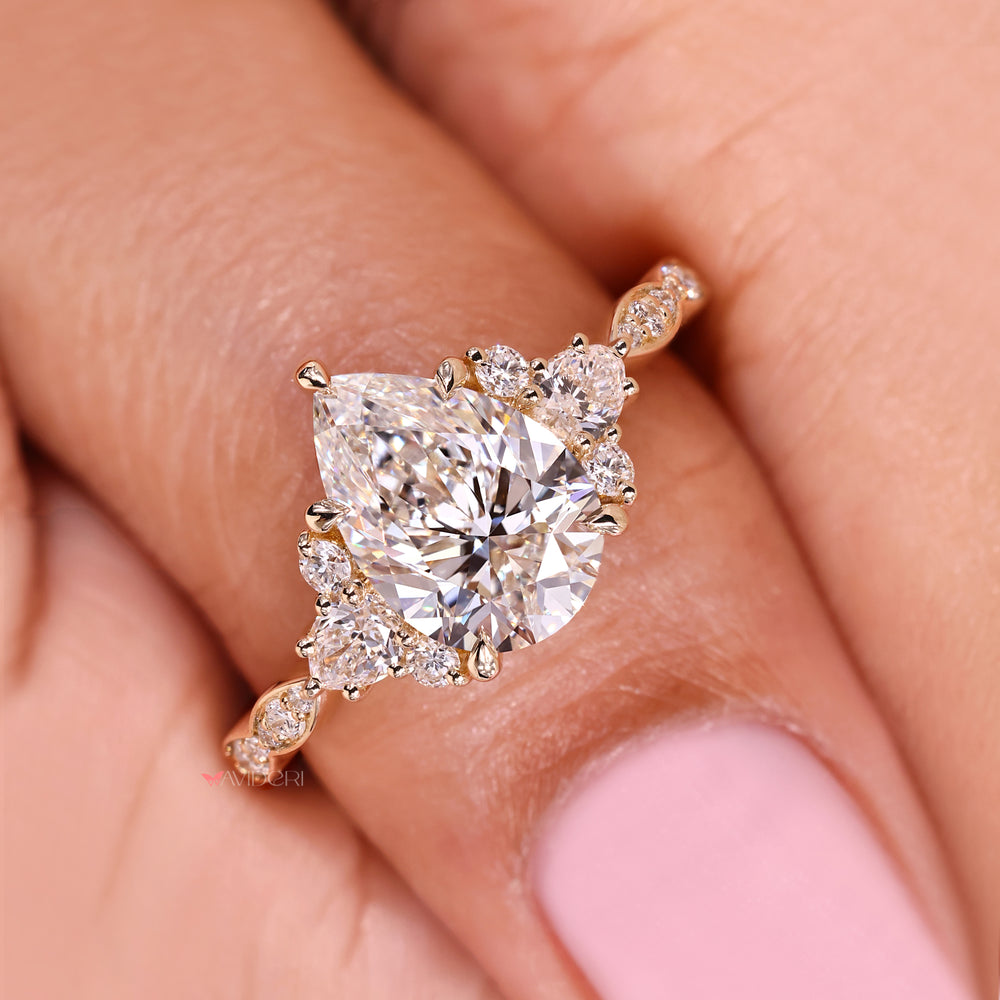 Vintage style pear cut ring with pave setting.
