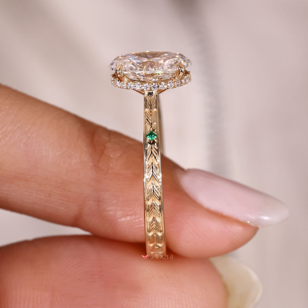 Lab grown oval diamond ring with cathedral setting.
