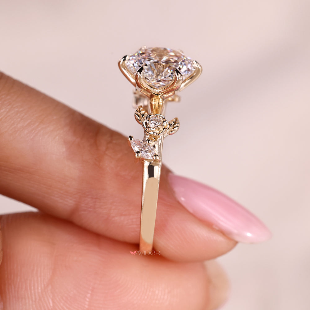 Handmade Portuguese cut diamond ring with round and marquise accents in six claw prong setting
