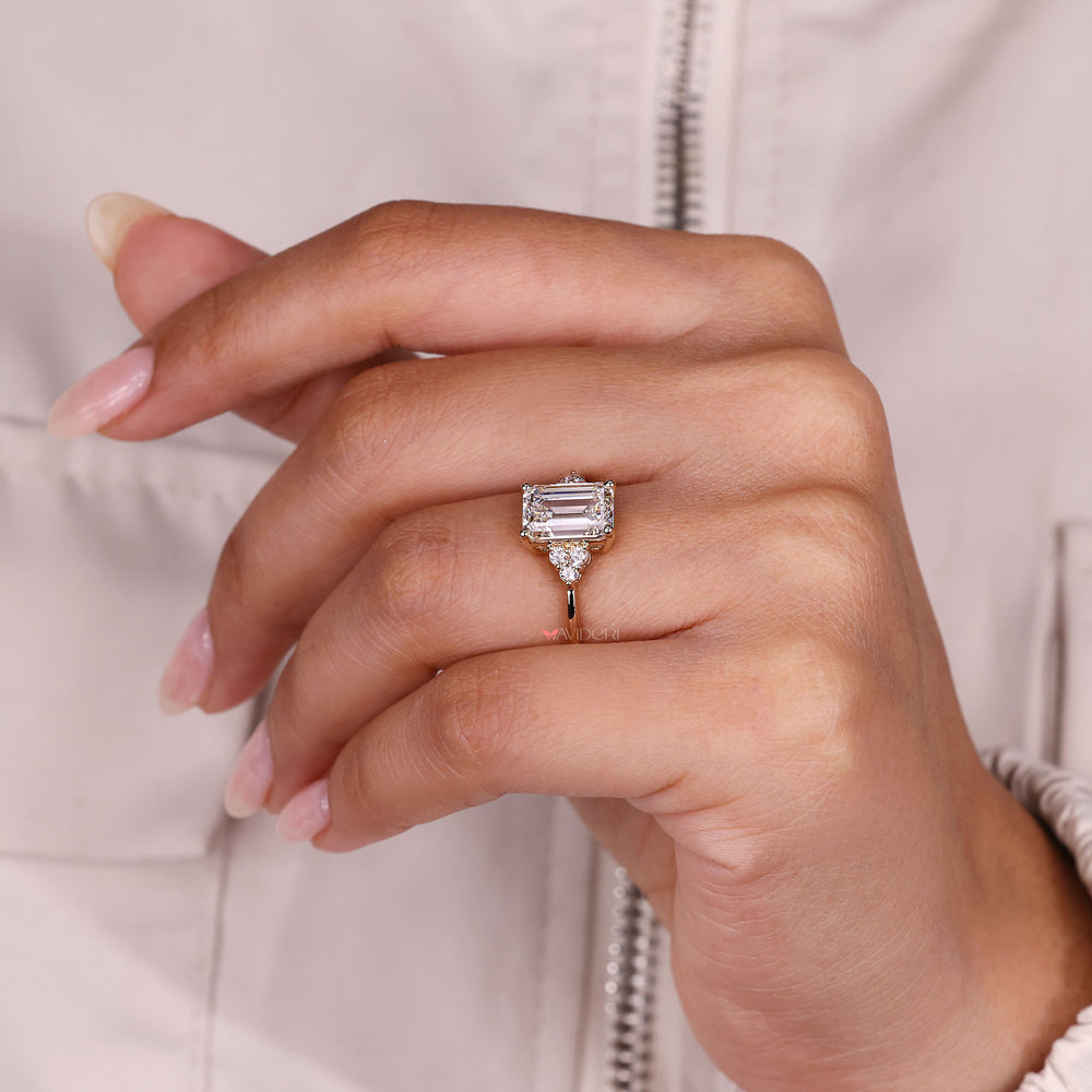 Emerald cut ring with four prong setting.
