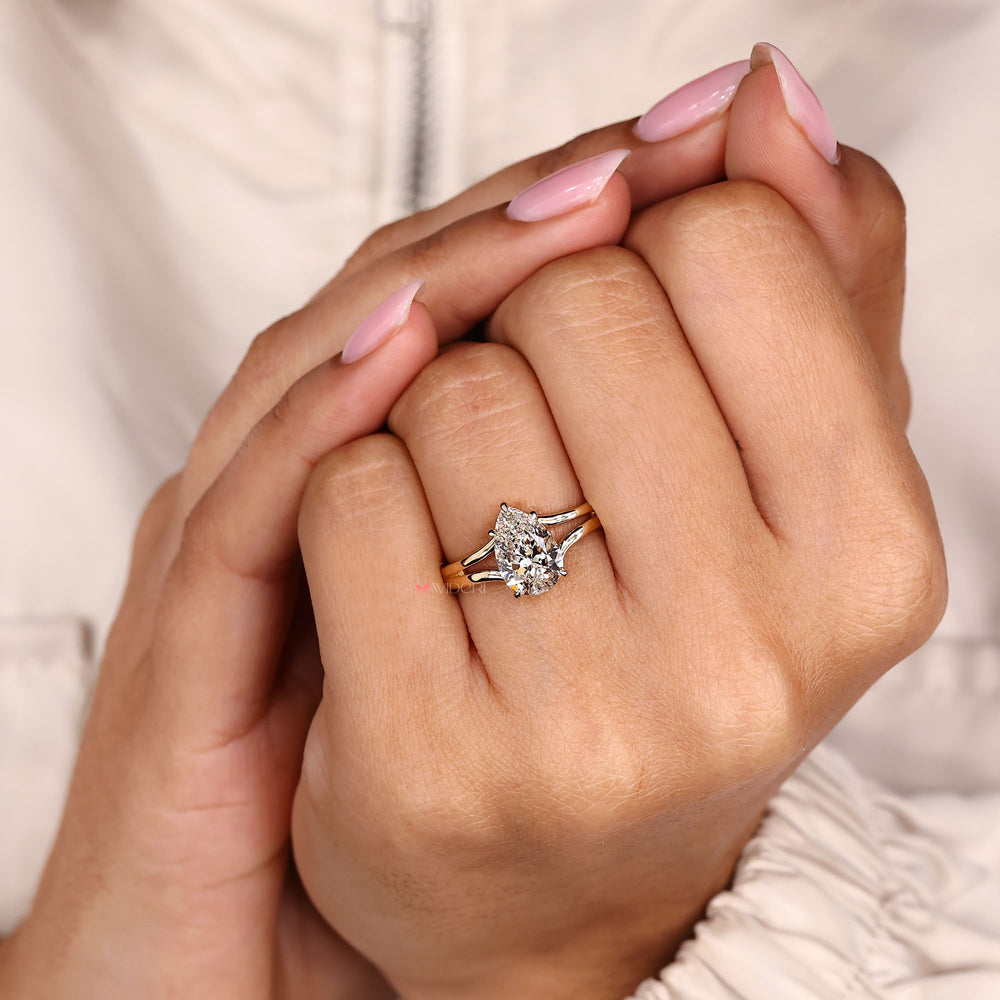 Avideri pear cut lab grown diamond ring with five prong design.