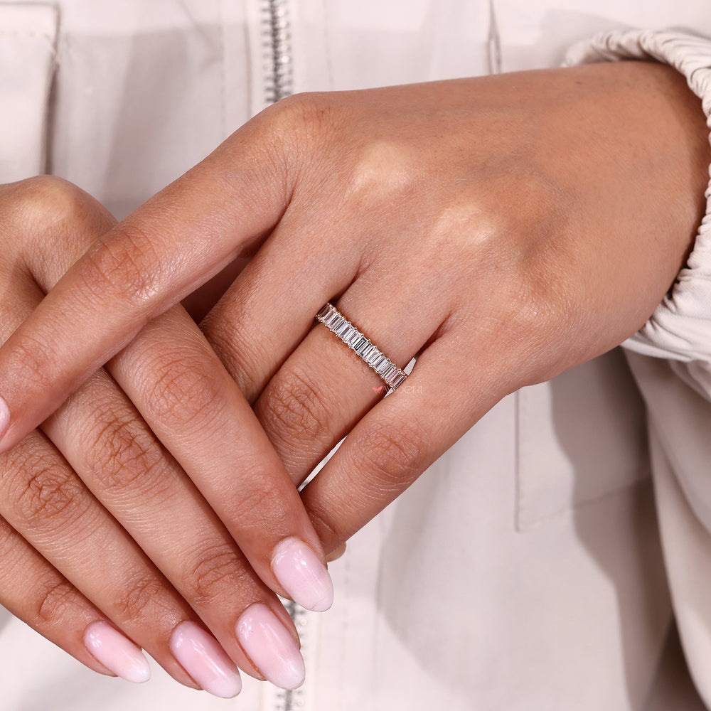 Half eternity diamond band with prong design.
