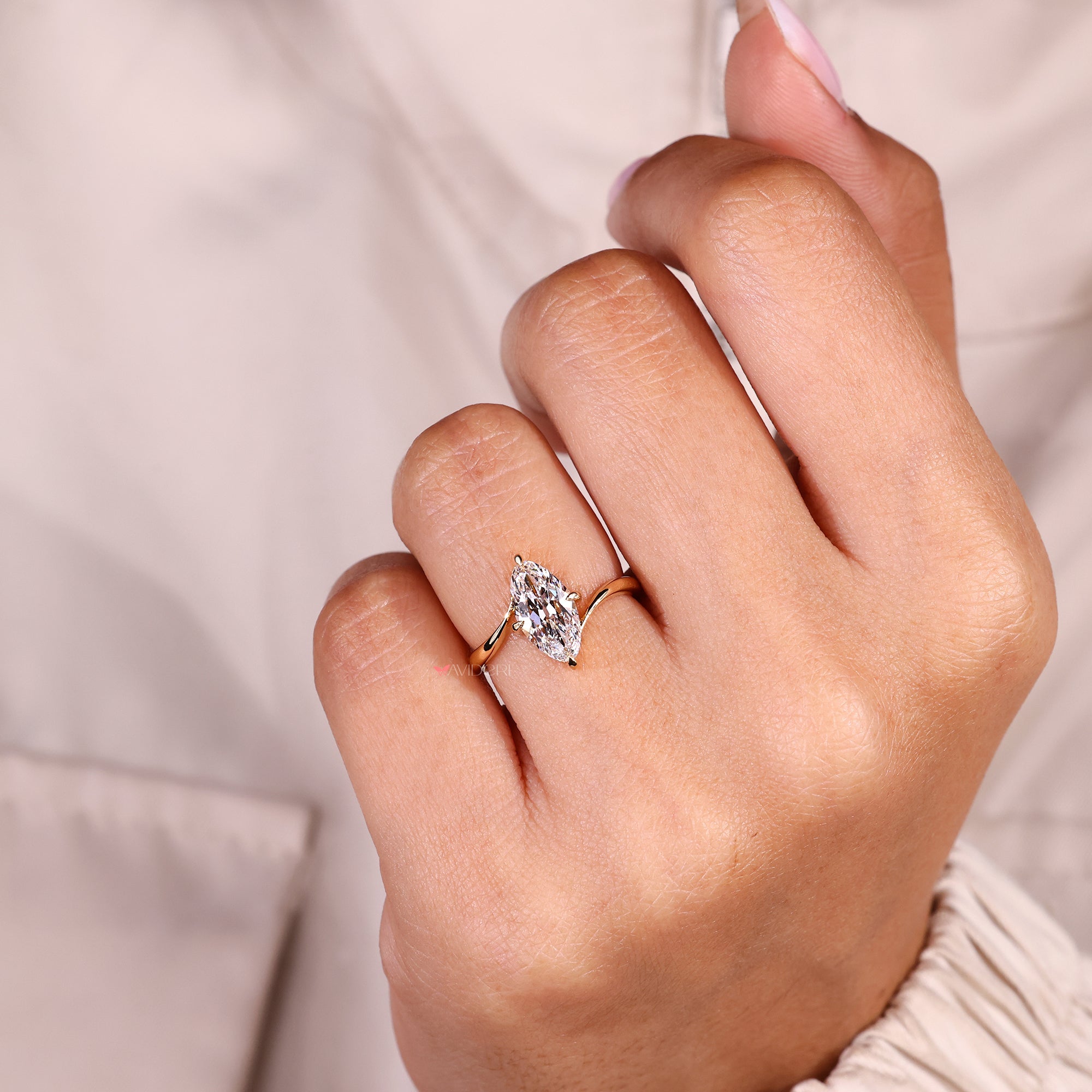 Marquise old European cut solitaire ring with prongs.