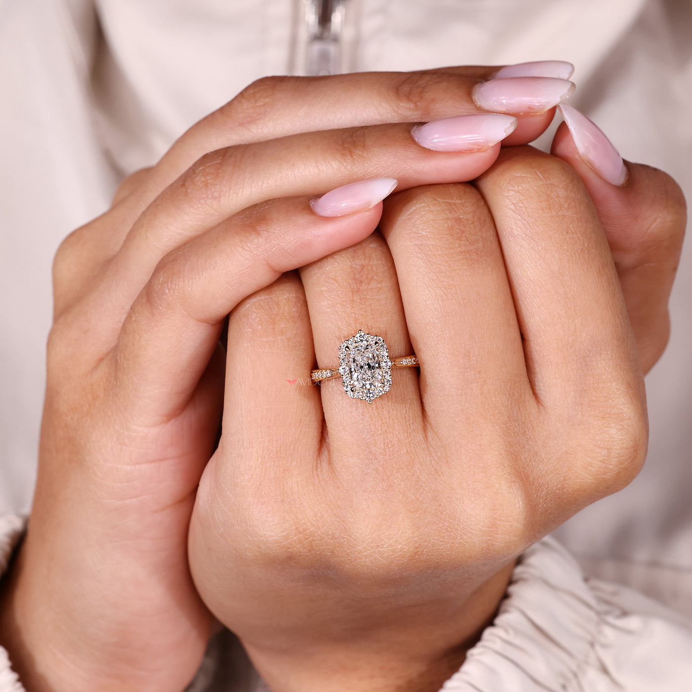 Handmade radiant diamond ring with halo style.
