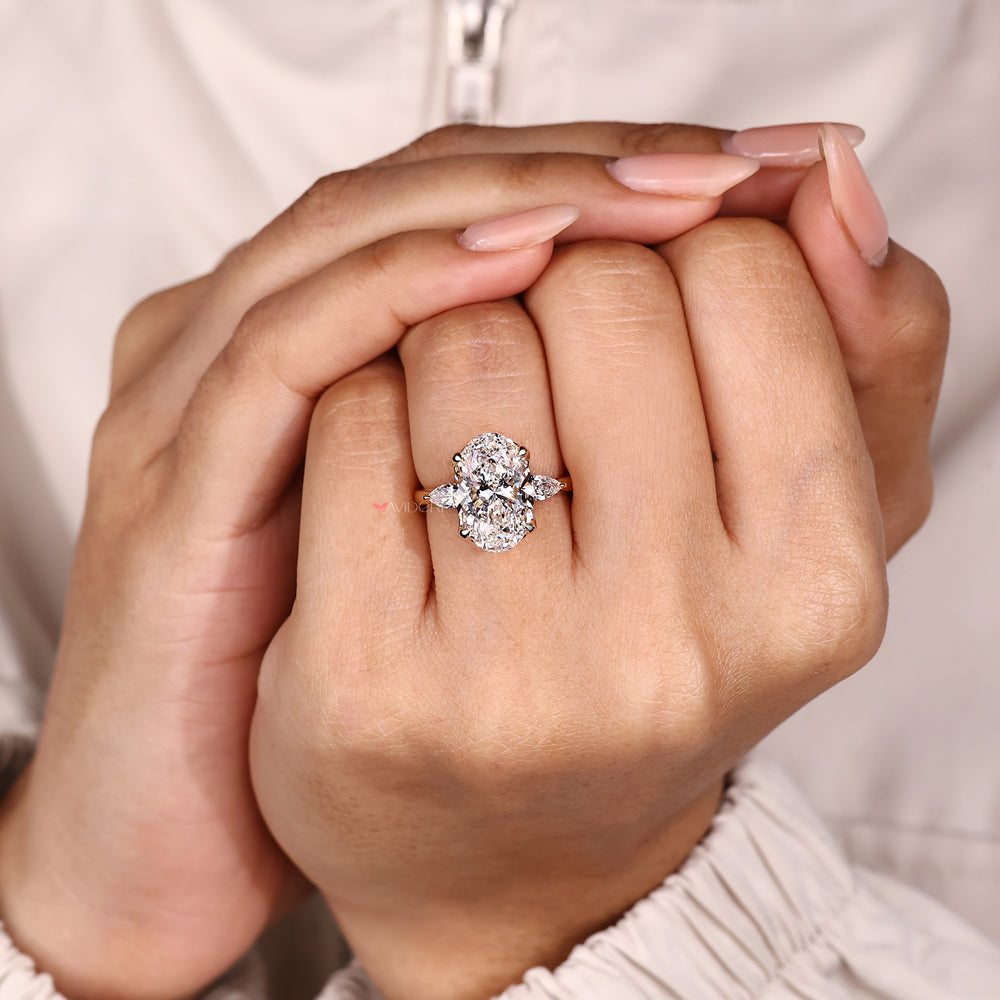 IGI certified oval diamond ring with pear sides.
