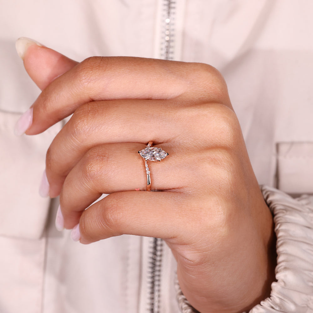 Handmade marquise diamond ring with v prong setting.

