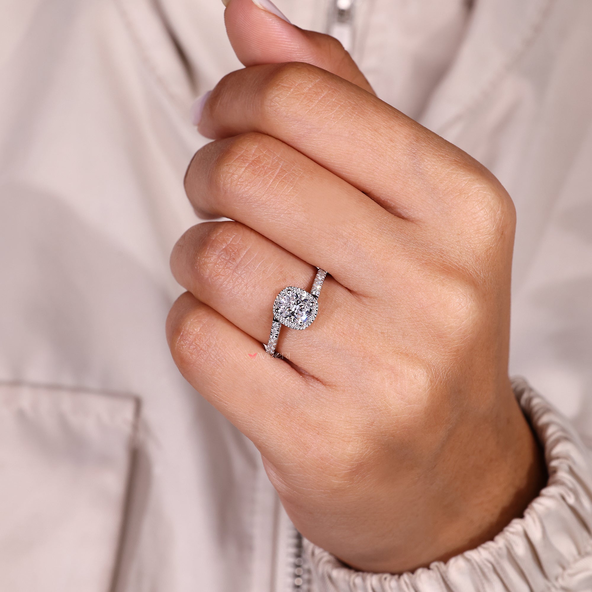 Handmade cushion diamond ring with pave setting.

