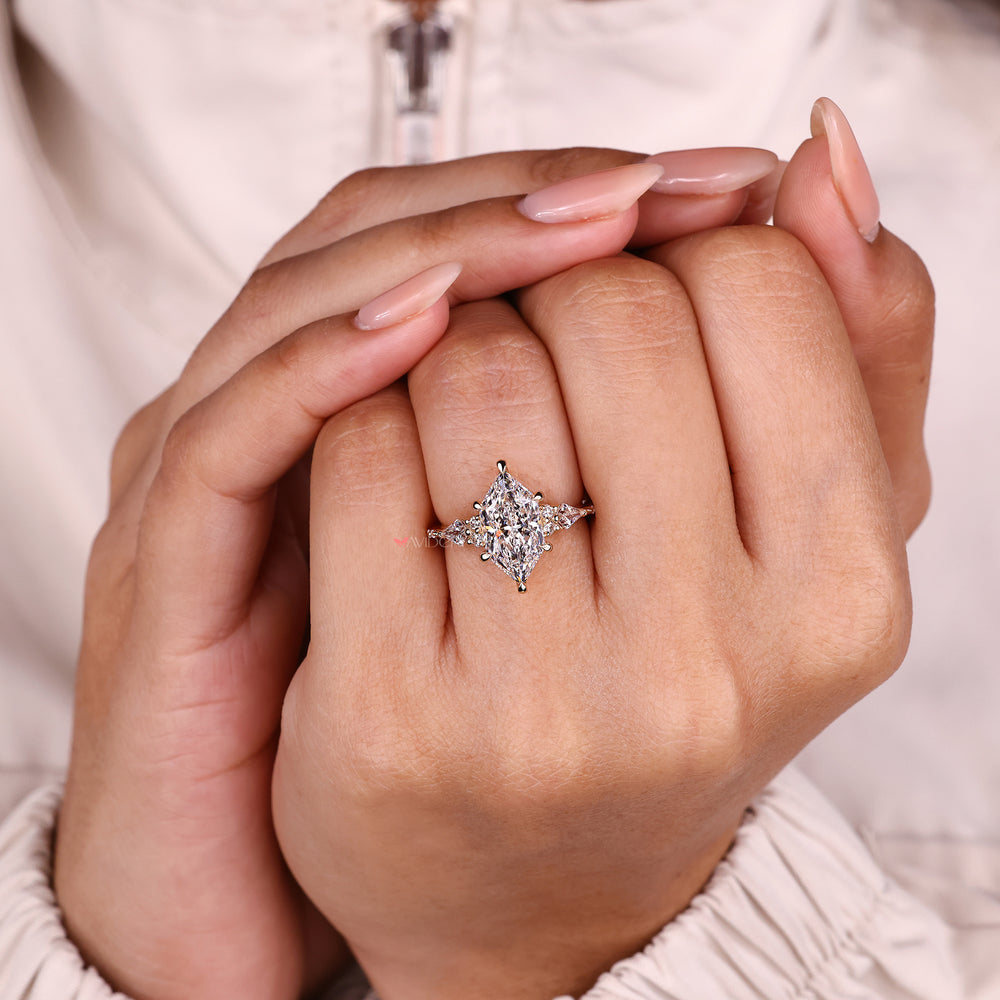 Vintage moissanite engagement ring with round halo.
