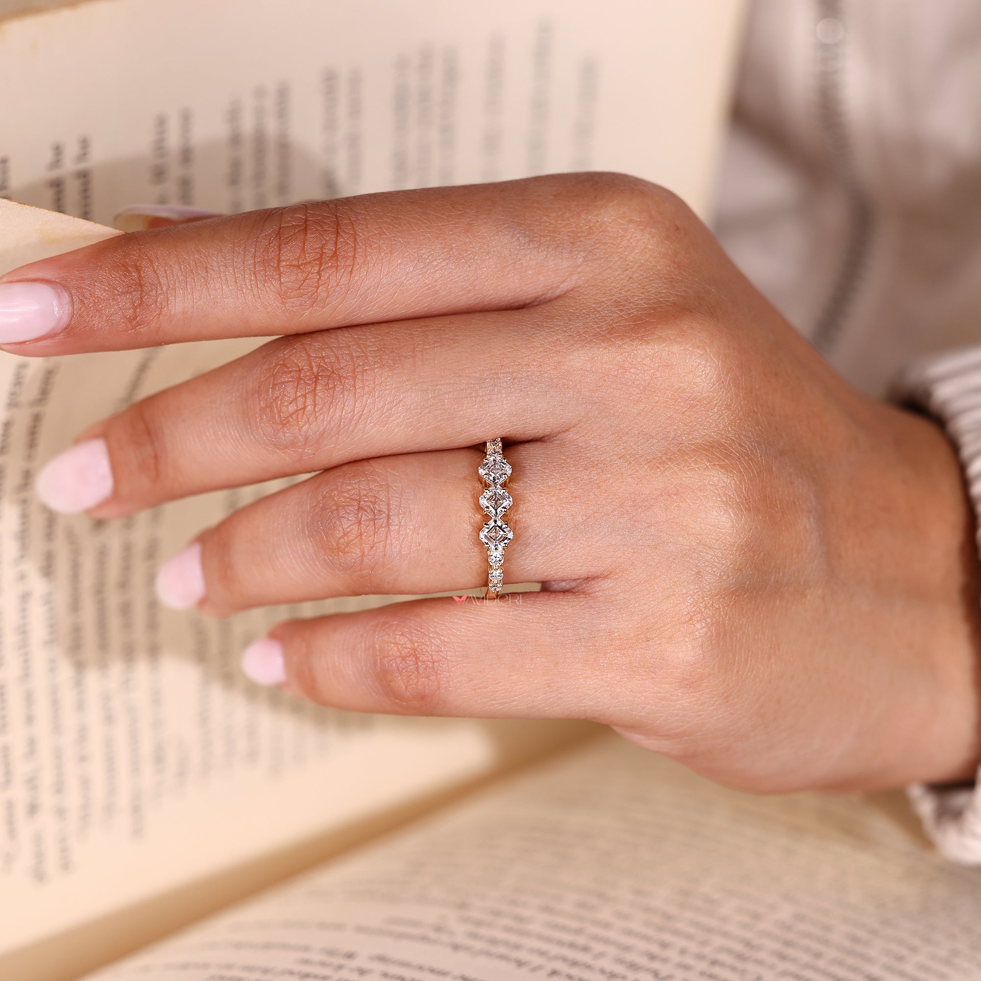 Asscher and round diamond half eternity band.

