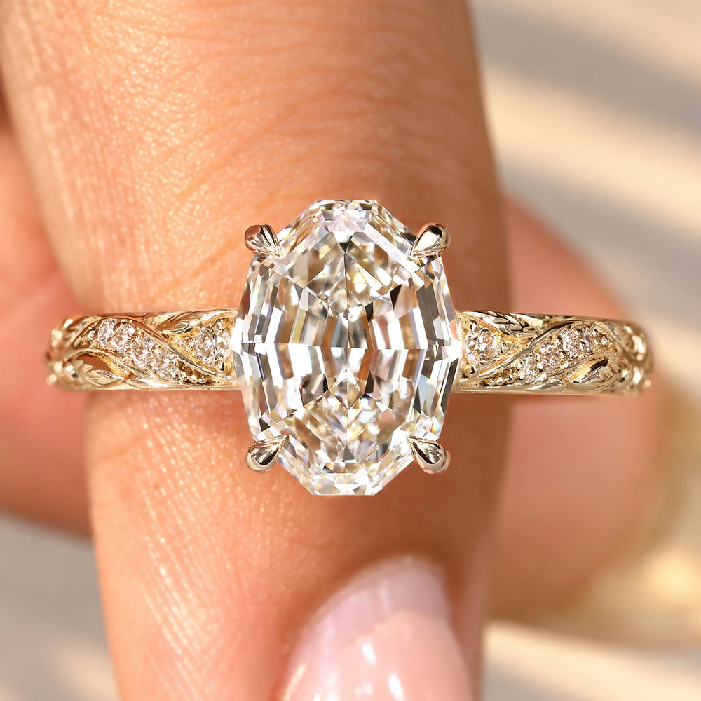 Nature inspired engagement ring with oval step cut diamond
