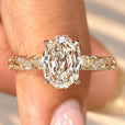 Nature inspired engagement ring with oval step cut diamond
