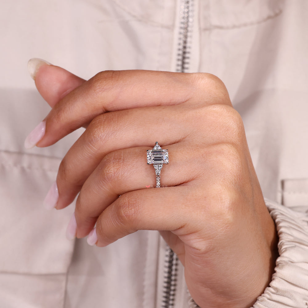 Handmade emerald diamond ring with trellis design.
