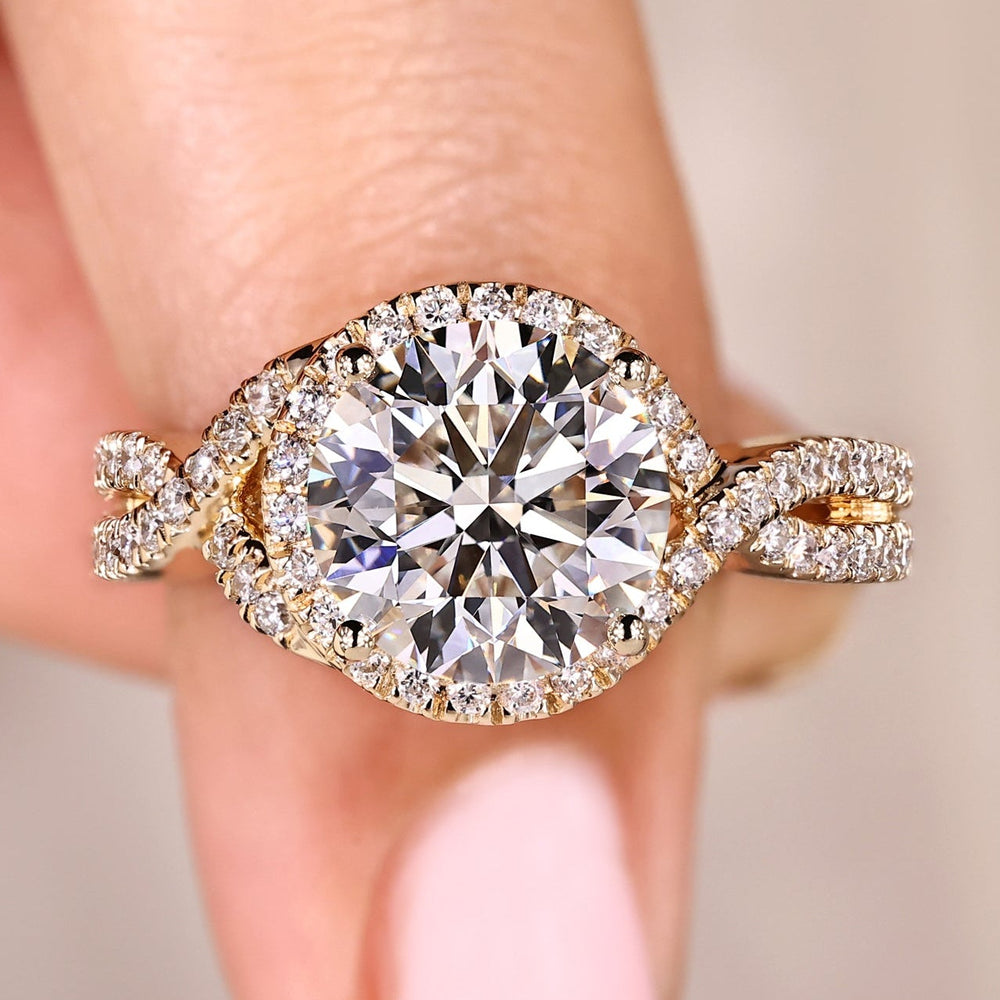 Handmade round diamond ring with twisted shank.