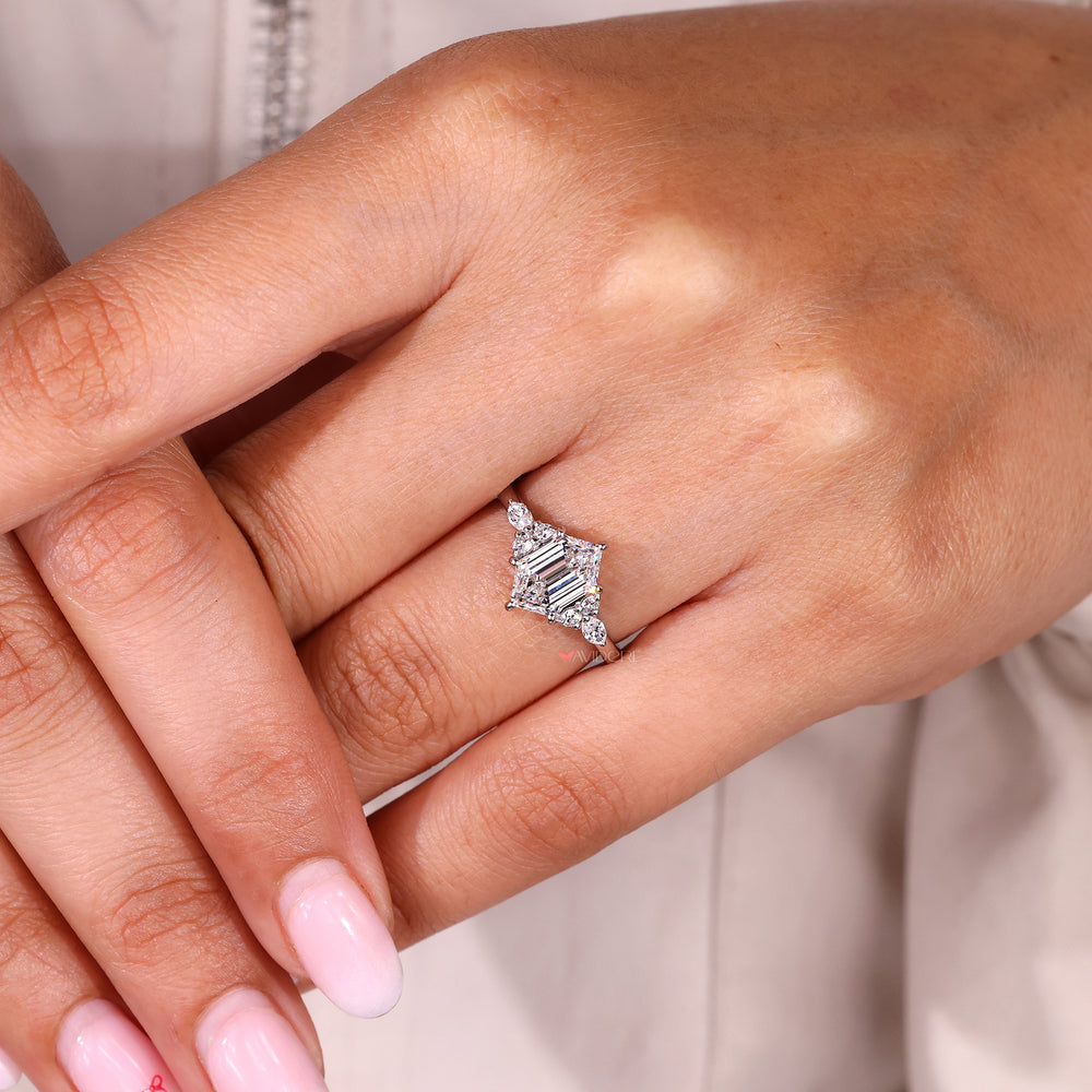 Hexagon center diamond ring with marquise and round stones.