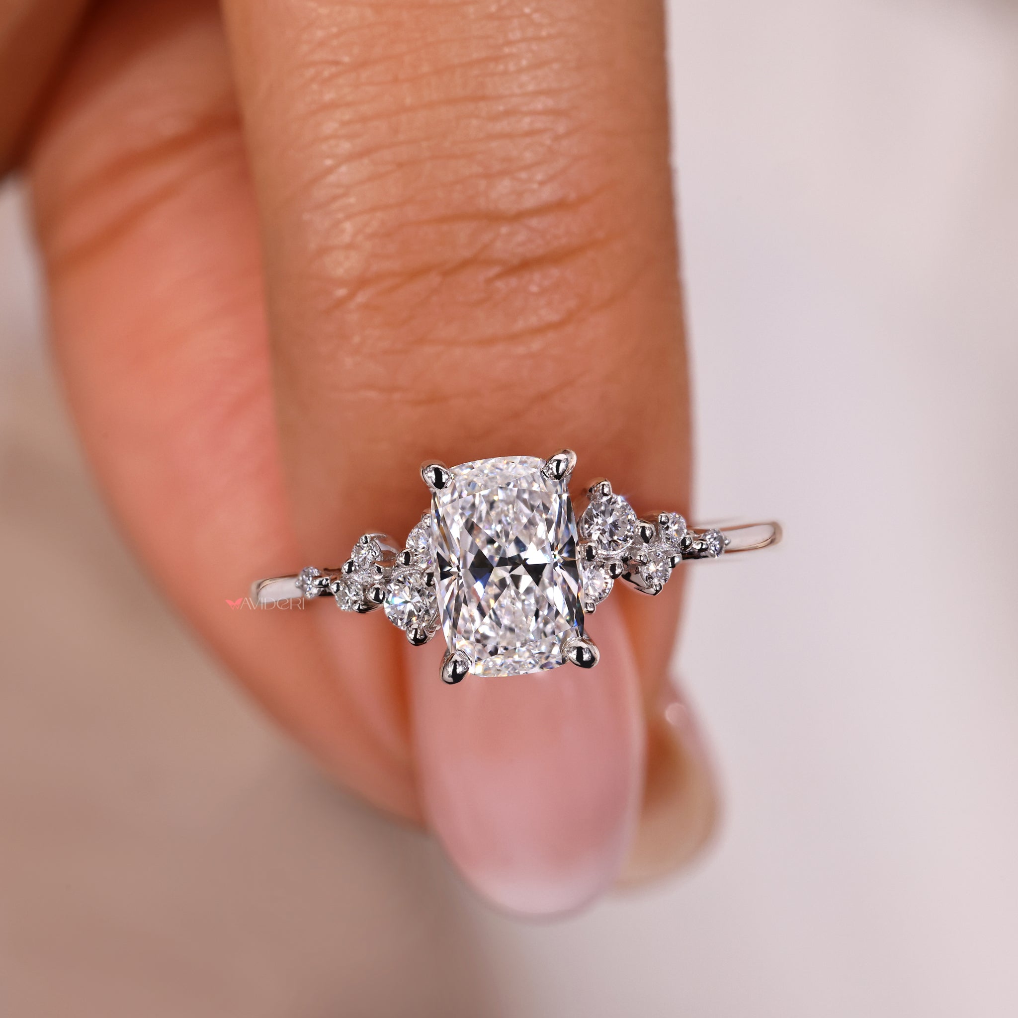 Prong setting ring with a cushion cut diamond brilliance
