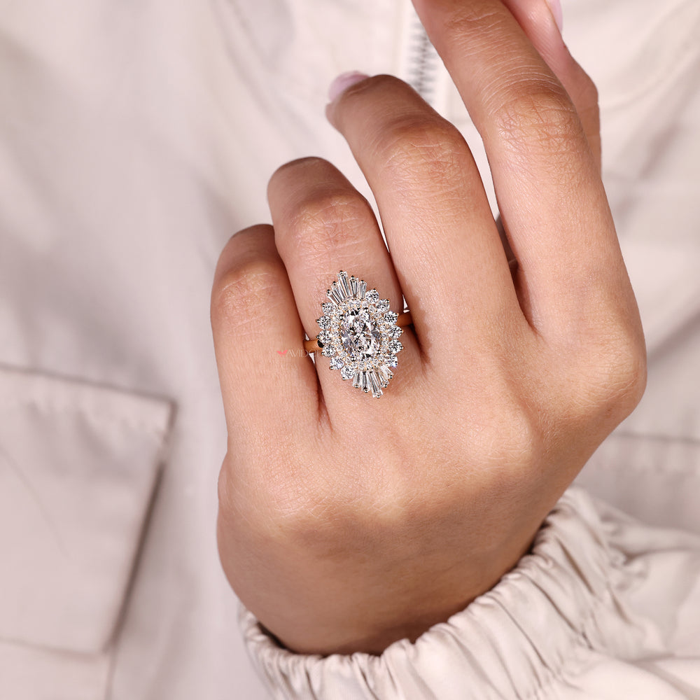 Double halo oval diamond ring with tapered baguette stones.