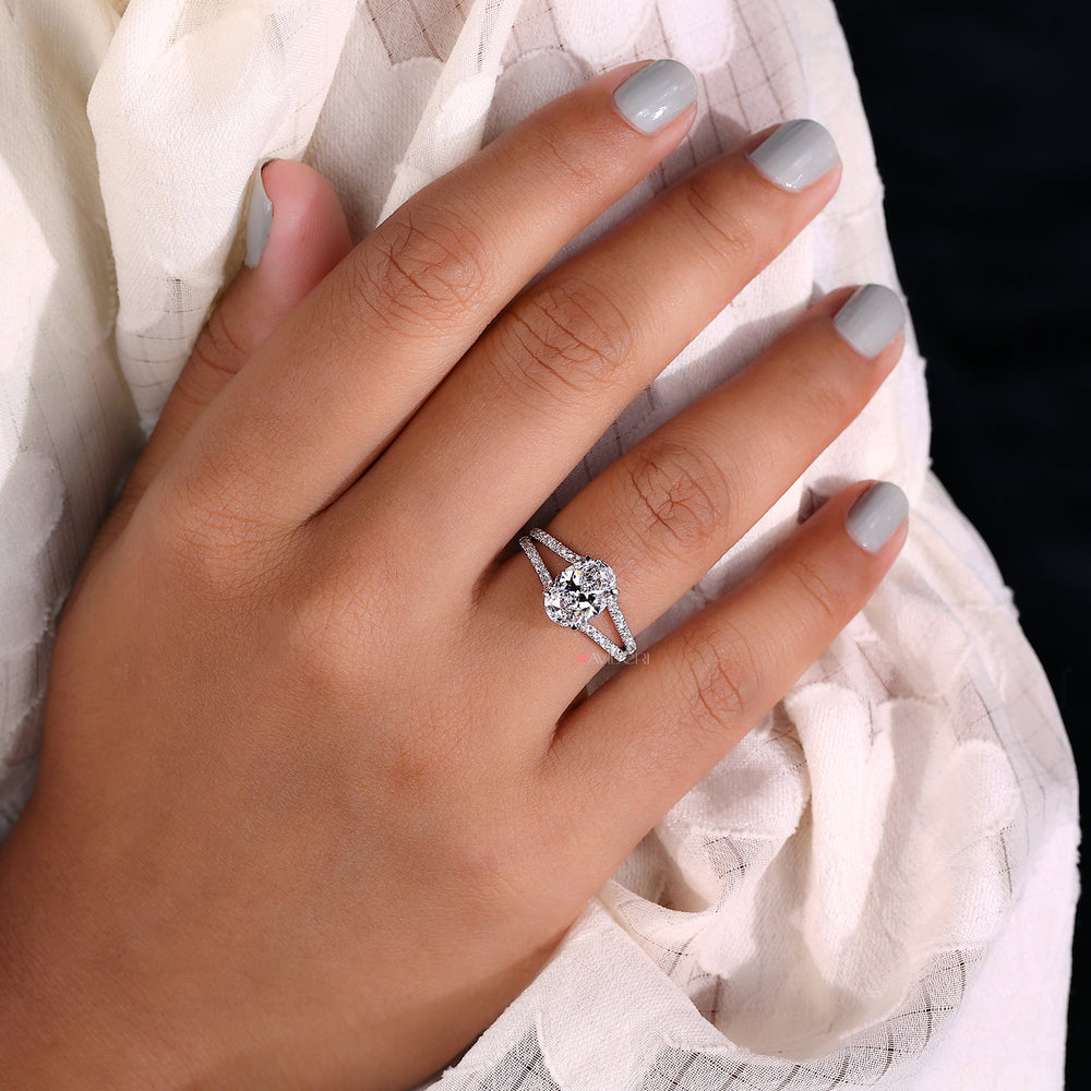 IGI certified oval diamond ring with split shank.
