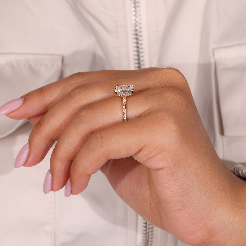 Radiant cut ring in a beautiful yellow gold diamond ring finish.
