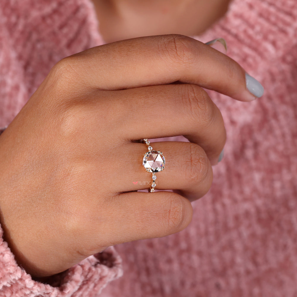 Double prong engagement ring with exceptional brilliance and secure setting.