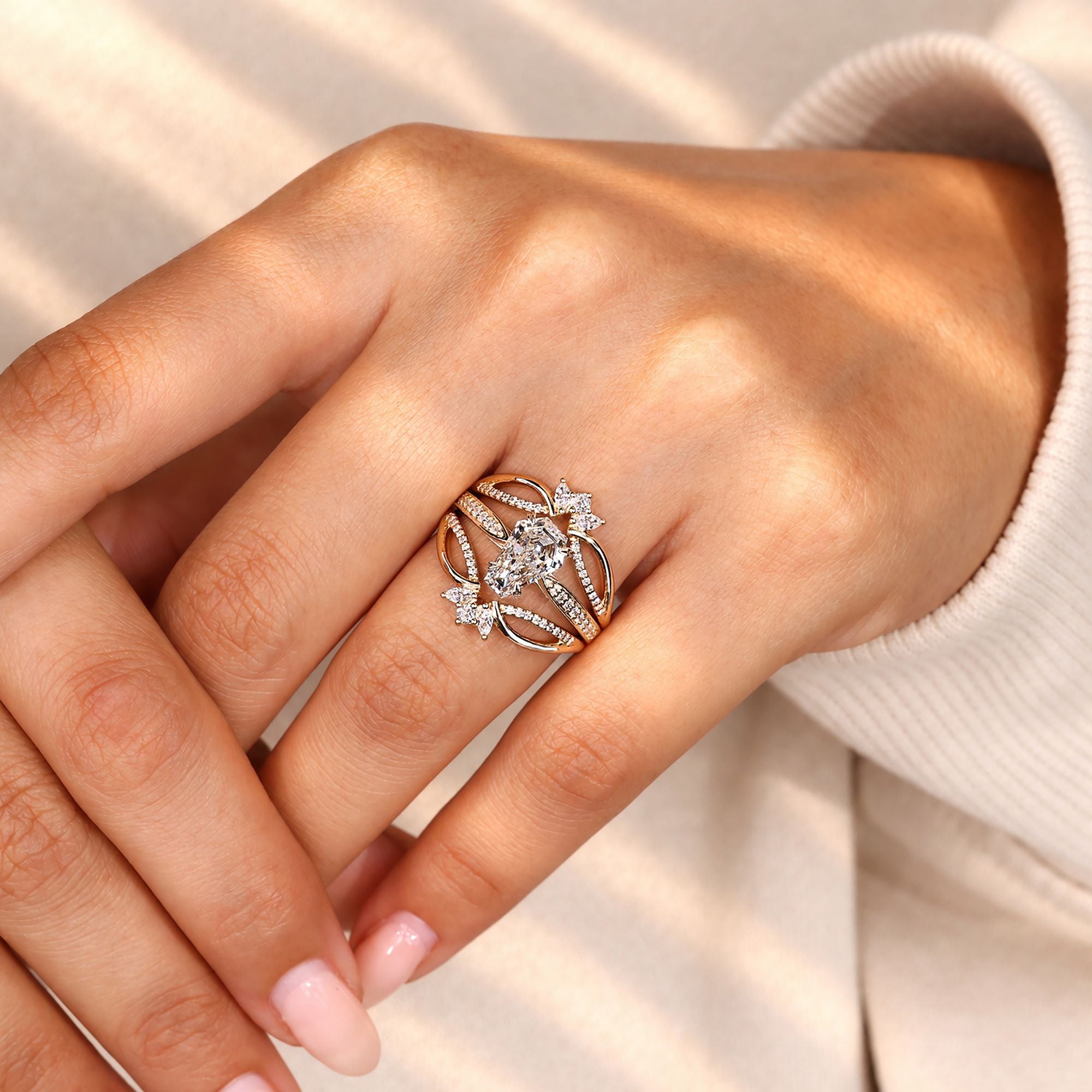 Coffin cut engagement ring with diamond enhancer band.
