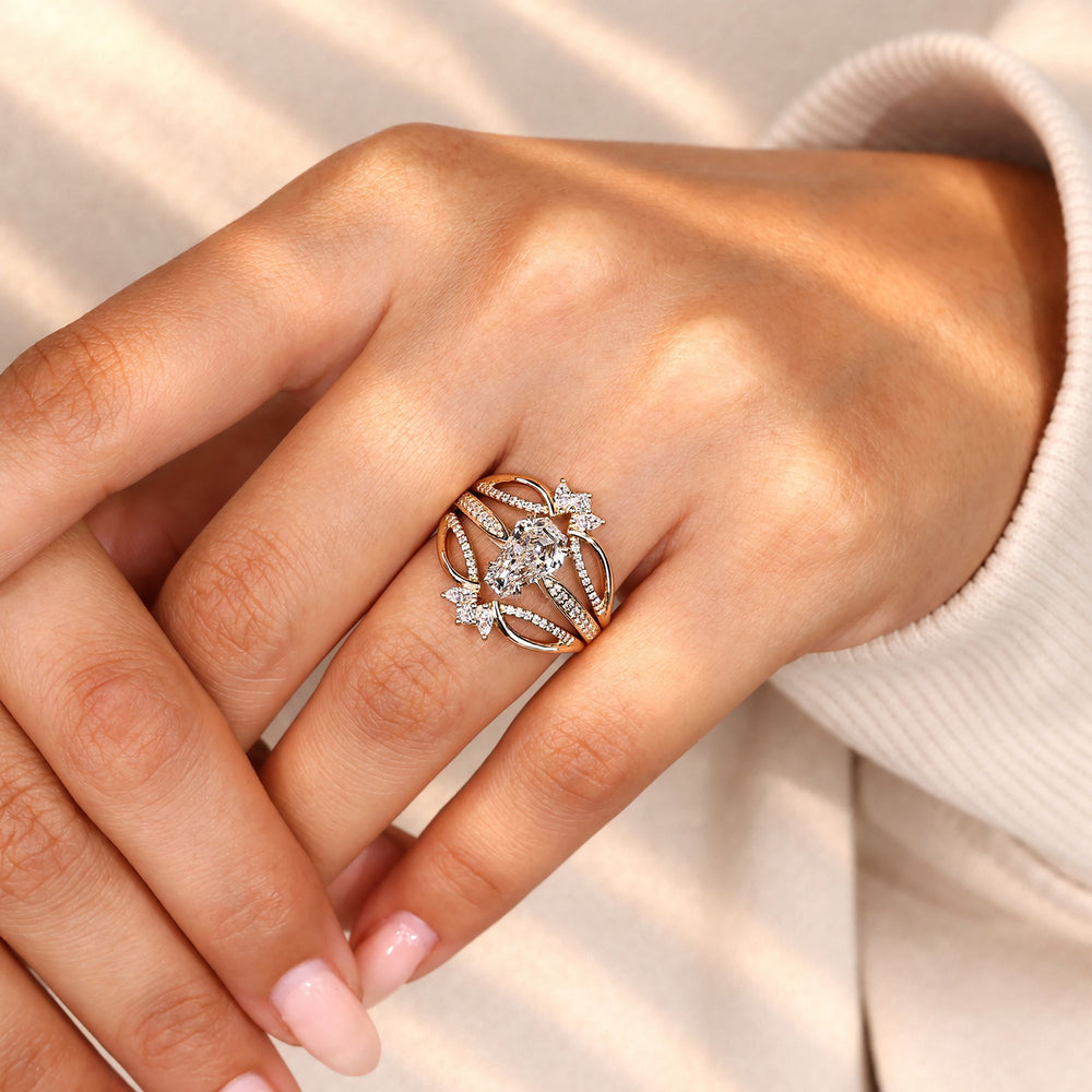 Coffin cut engagement ring with diamond enhancer band.
