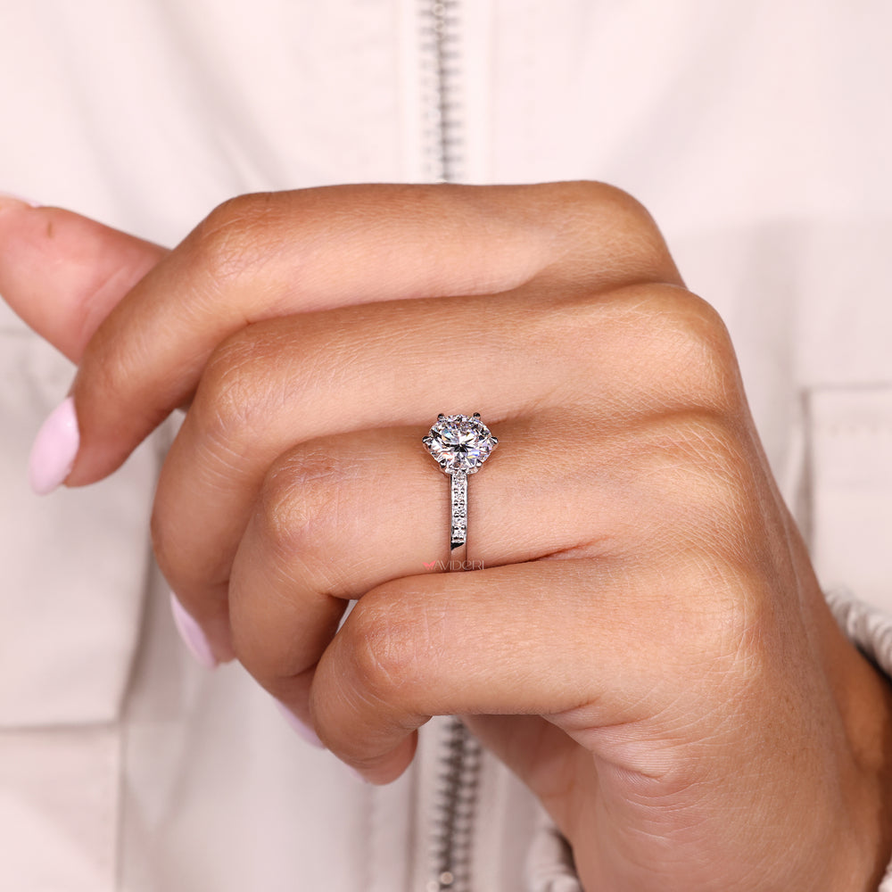 Handmade round diamond ring with six claw prong setting

