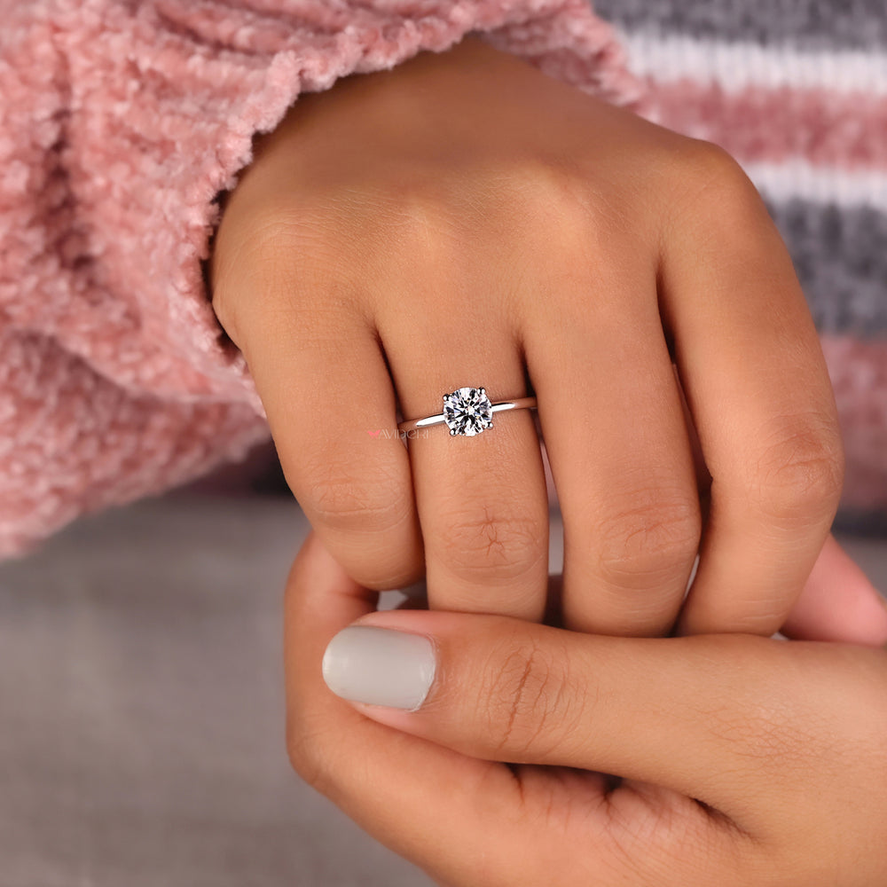 Handmade jewelry featuring an avideri ring crafted with a round brilliant cut diamond and prong setting.
