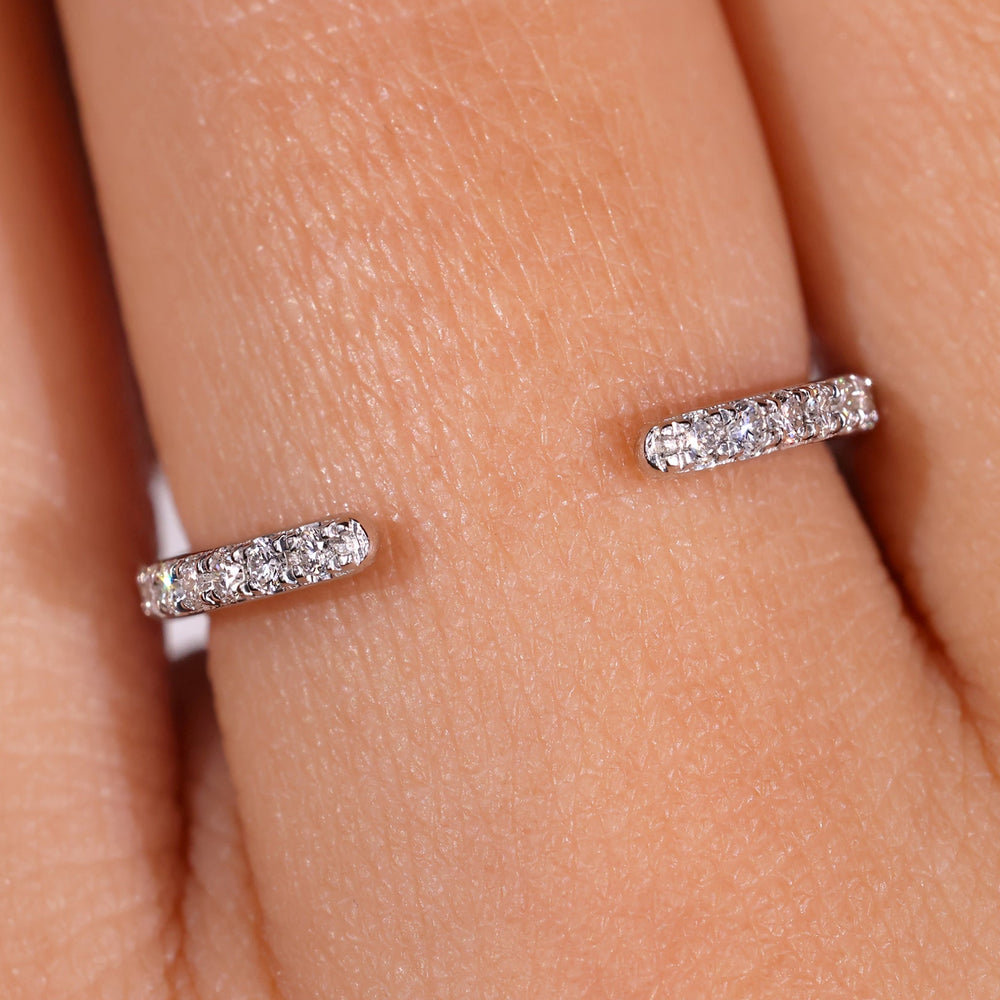Open gap wedding band in white gold.