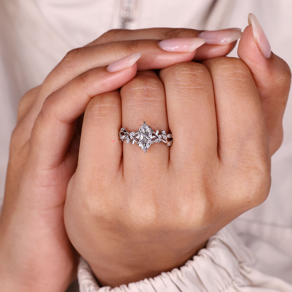 Nature inspired marquise diamond engagement ring.
