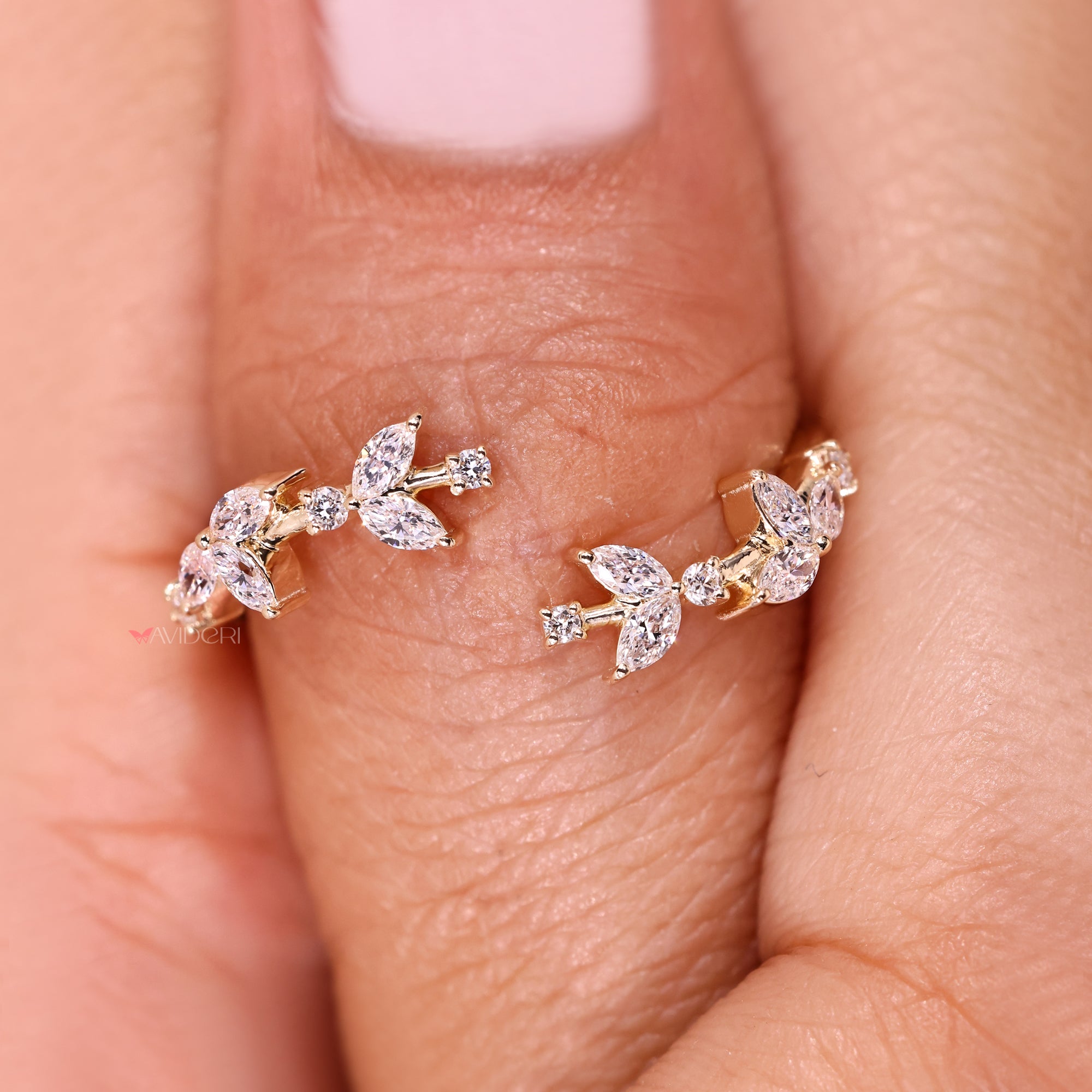 Open gap diamond band with marquise accents.
