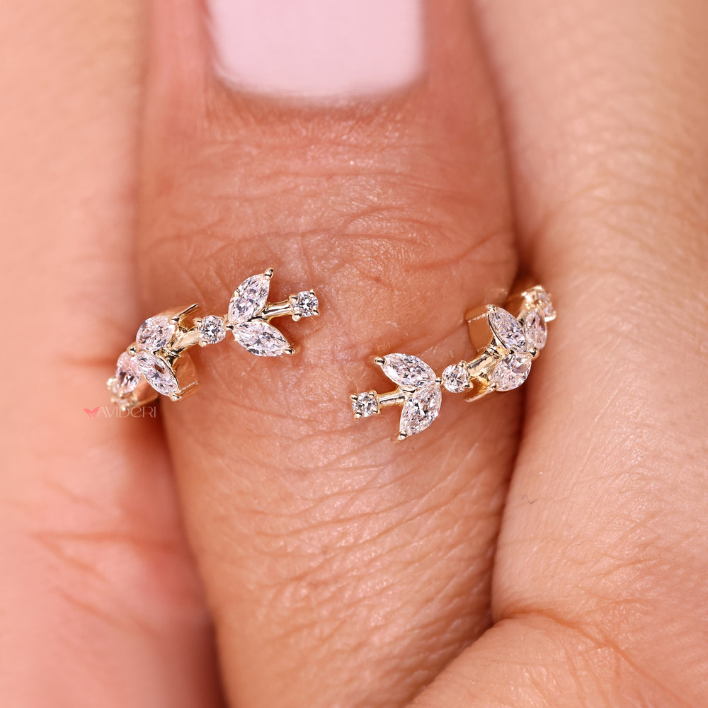 Open gap diamond band with marquise accents.
