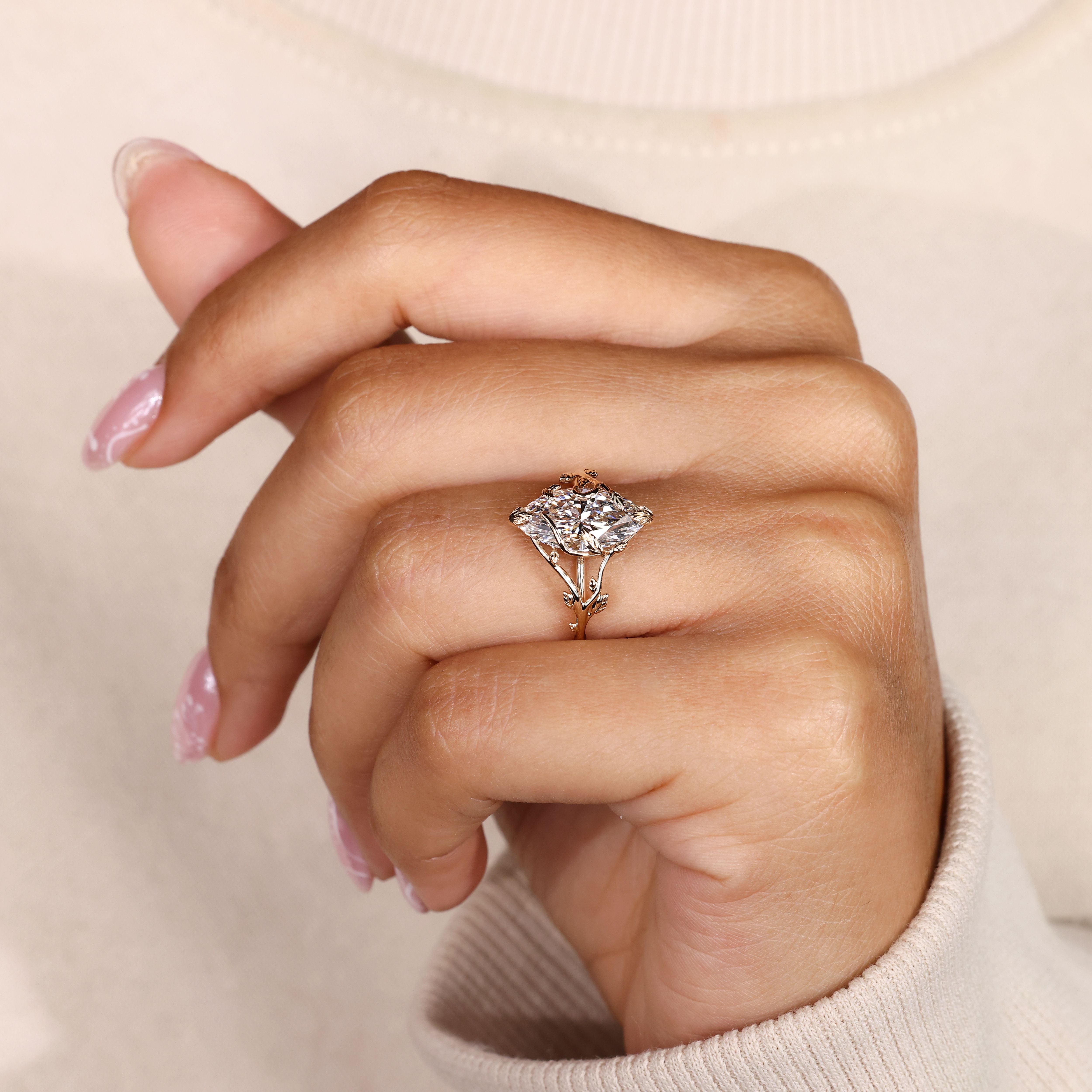 Handmade nature inspired marquise diamond ring.
