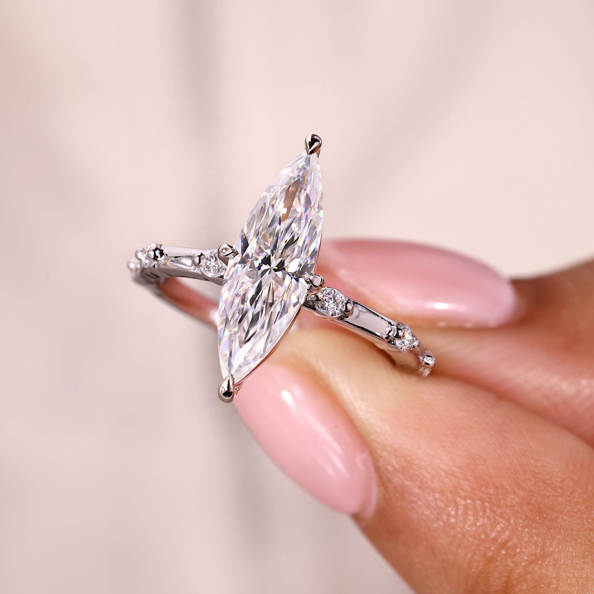 A moissanite engagement ring offering brilliance and ethical beauty in one refined piece.
