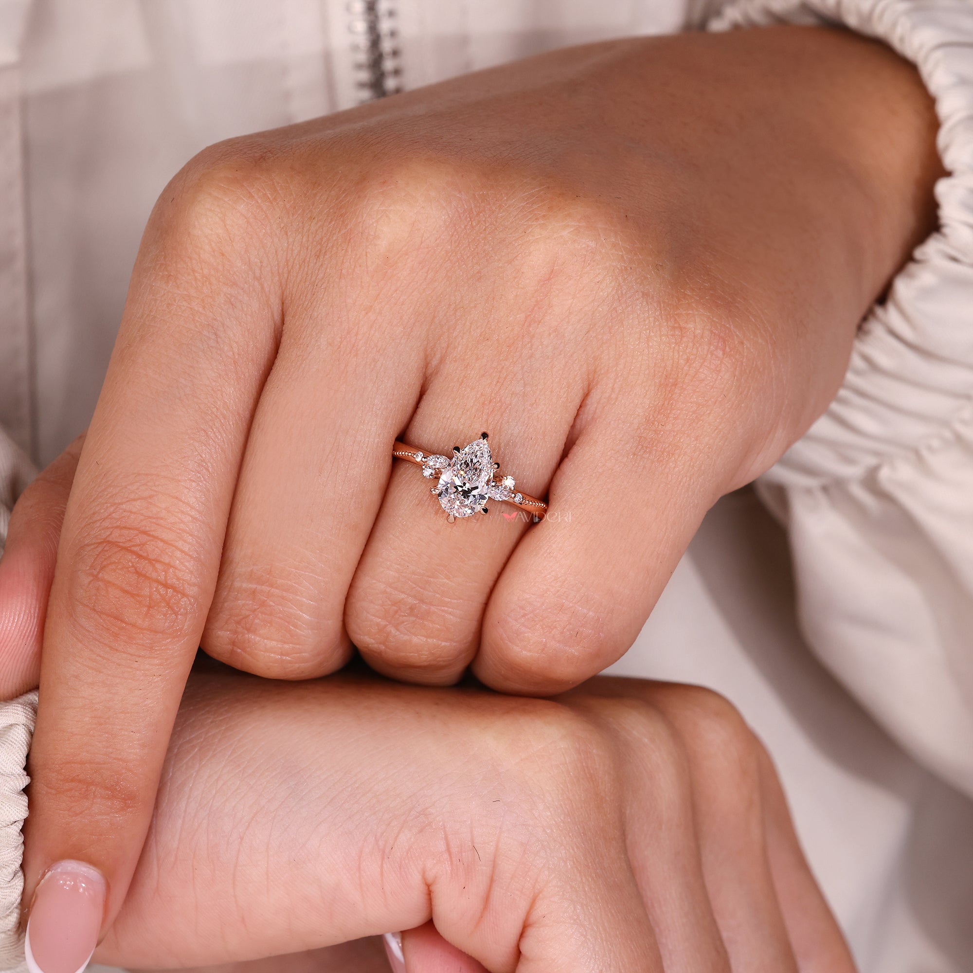 Avideri engagement ring with pear diamond engagement ring.

