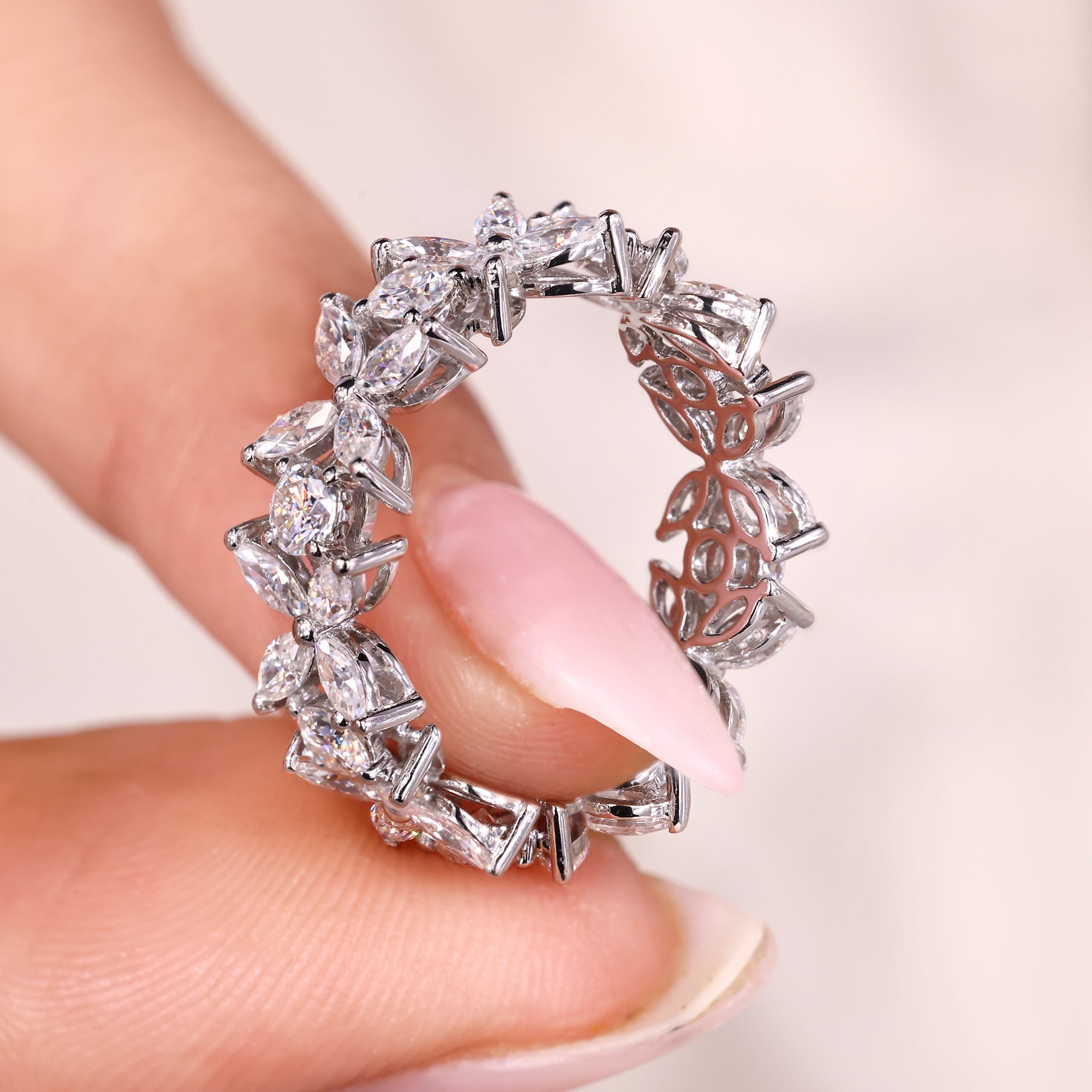 A marquise cut band adds sharp angles and a unique look.