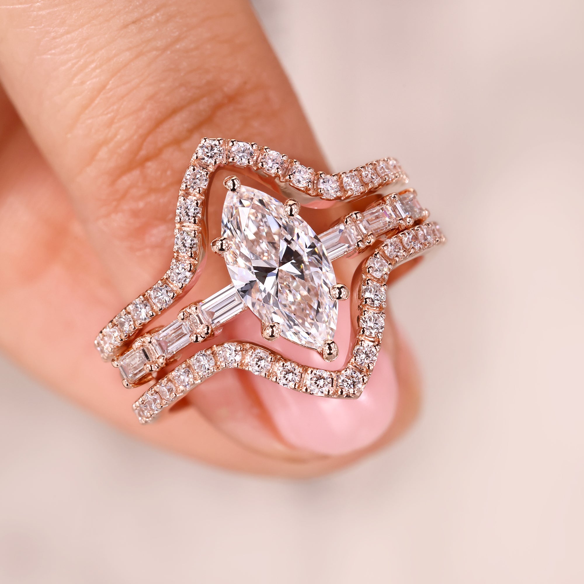 Marquise ring with wedding band in rose gold bridal set.